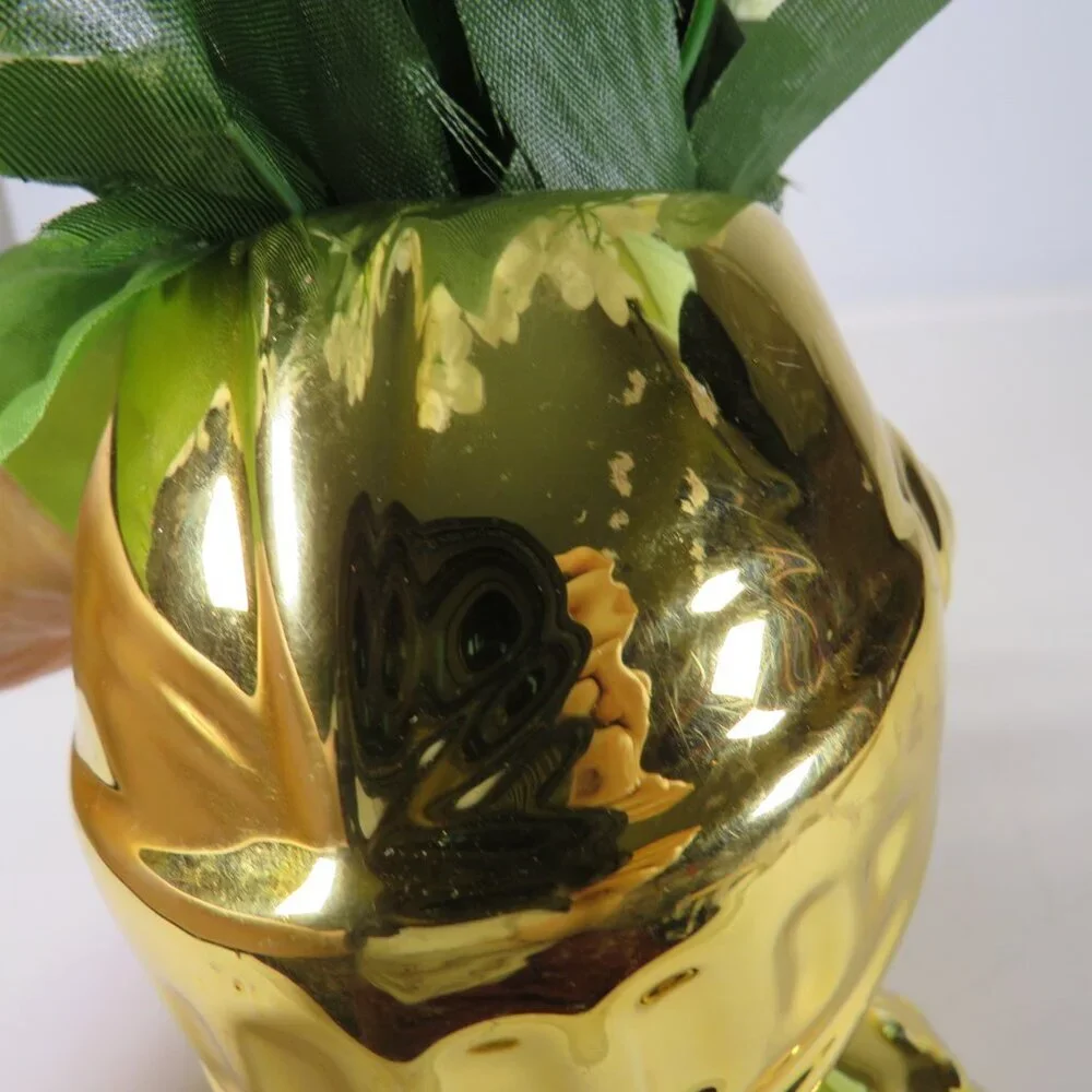Gold Knight in Shining Armor with White Flowers
